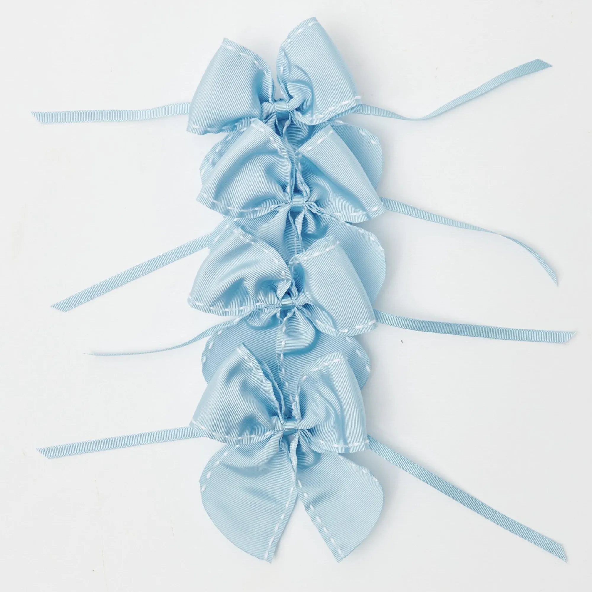 blue_saddle_stitch_napkin_0.webp Clearance Blue Saddle Stitch Napkin Bows (Set Of 4) Napkin Rings, Bows & Wreaths