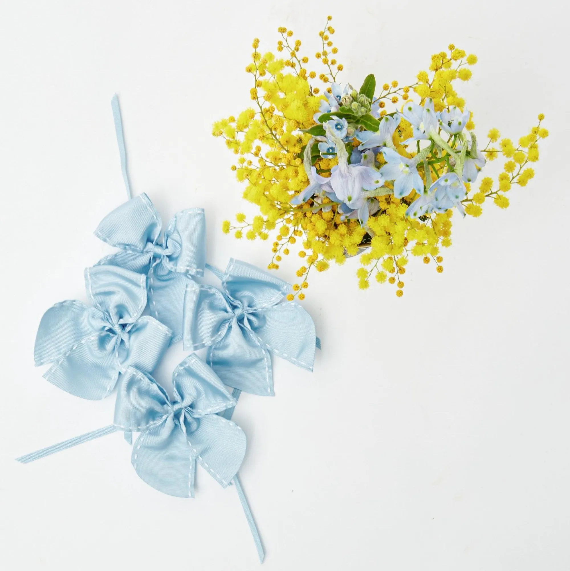 blue_saddle_stitch_napkin_11.webp Clearance Blue Saddle Stitch Napkin Bows (Set Of 4) Napkin Rings, Bows & Wreaths