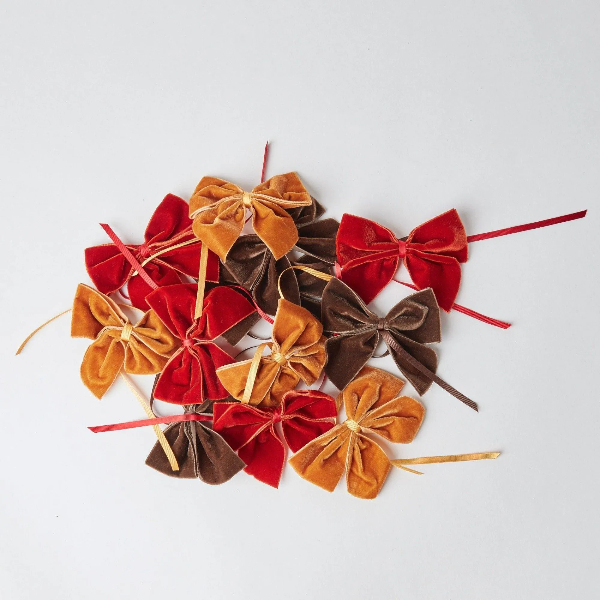 burnt_orange_napkin_bows__13.webp Shop Burnt Orange Napkin Bows (Set Of 4) Napkin Rings, Bows & Wreaths